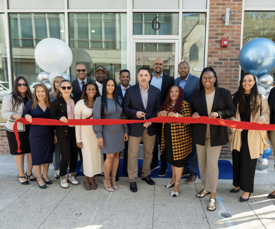 Monge Capital ribbon cutting